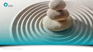 Harmony, stones in sand ripples.